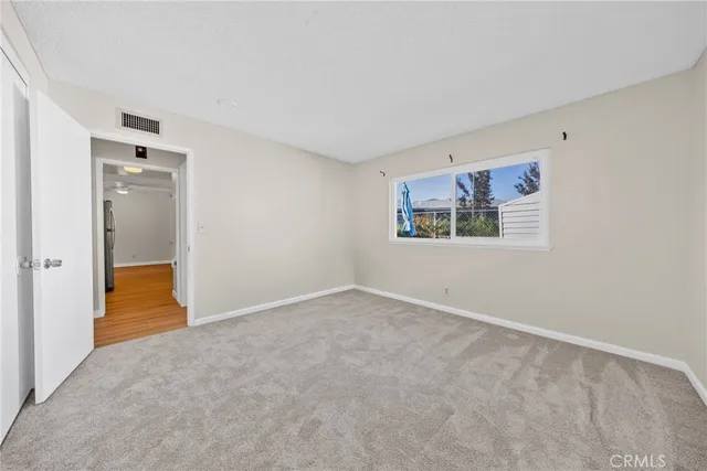 an empty room with a door