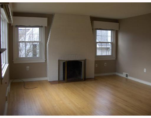 134 Buttercup Road Butler, PA 16001 - Photo 2 of 5 Living Room. 16X16 with hardwood floors and log burning fireplace