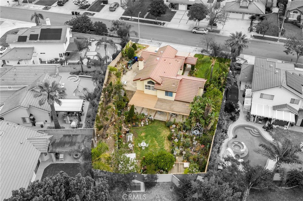 6990 Stanislaus Place Rancho Cucamonga, CA 91701 - Photo 21 of 25 an aerial view of multiple houses with yard