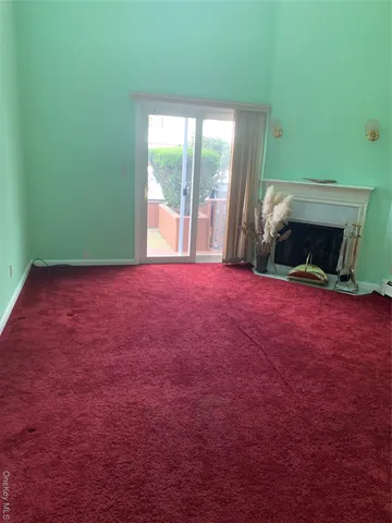 a view of empty room with front door