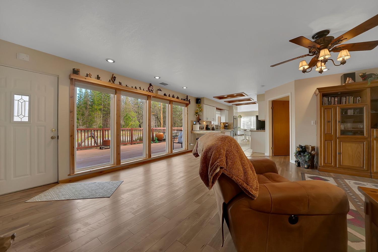 301 Bald Mountain Road West Point, CA 95255 - Photo 17 of 55 a living room with furniture and a floor to ceiling window