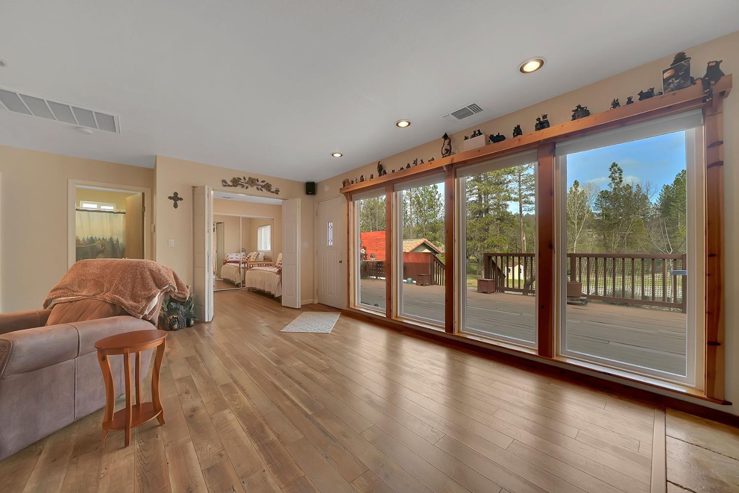 301 Bald Mountain Road West Point, CA 95255 - Photo 21 of 55 a living room with furniture and a large window