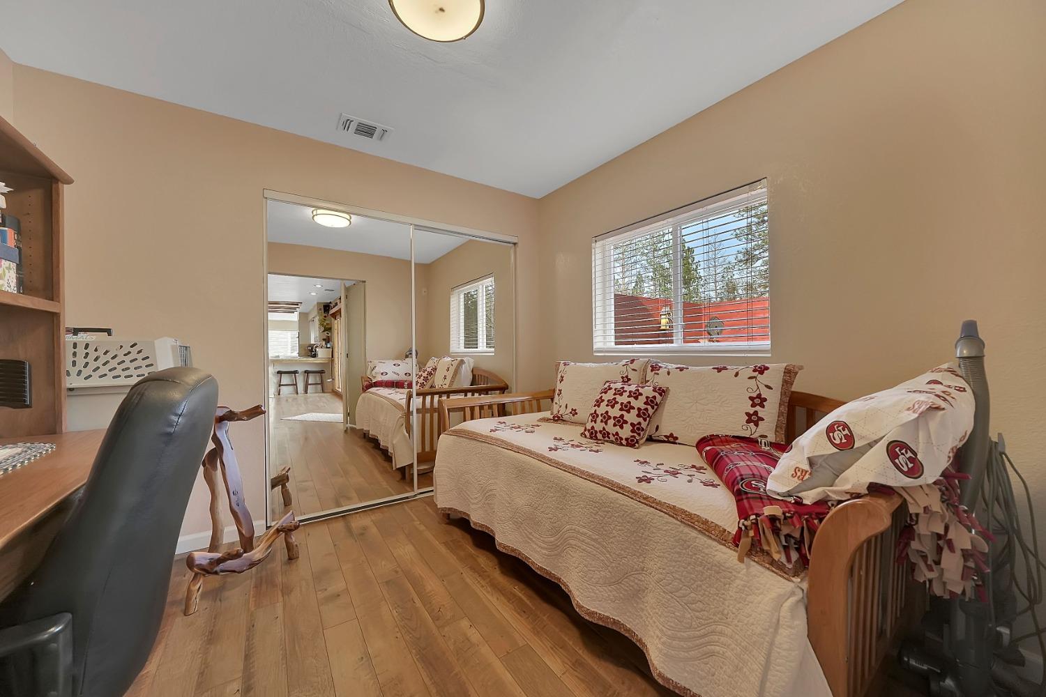 301 Bald Mountain Road West Point, CA 95255 - Photo 22 of 55 a living room with furniture and a large window