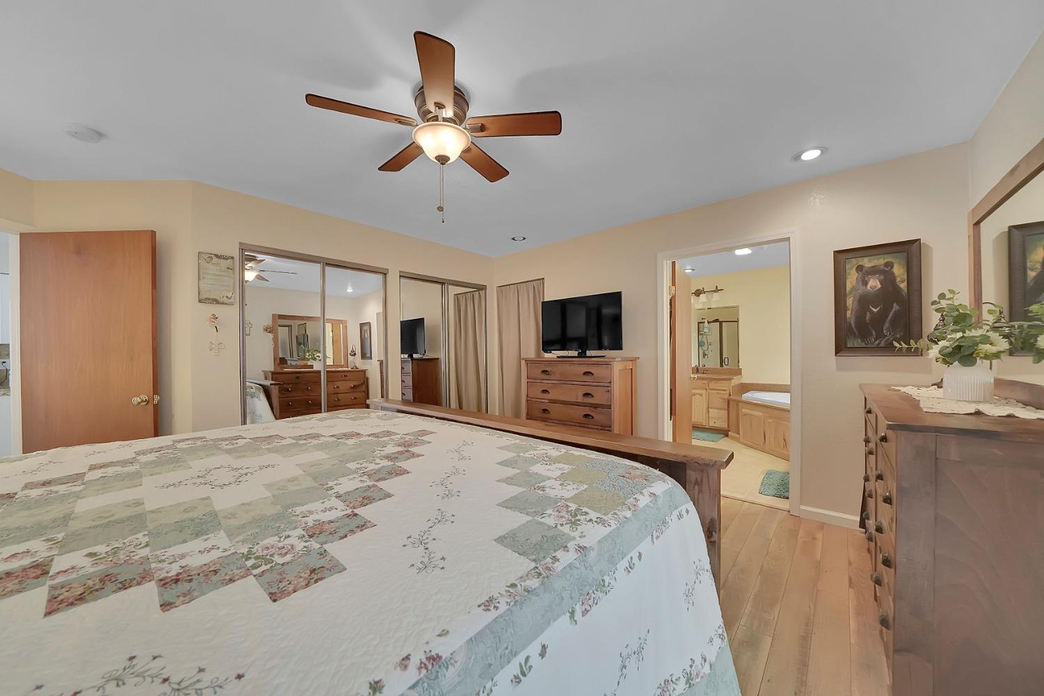 301 Bald Mountain Road West Point, CA 95255 - Photo 33 of 55 a bedroom with a bed and a flat screen tv