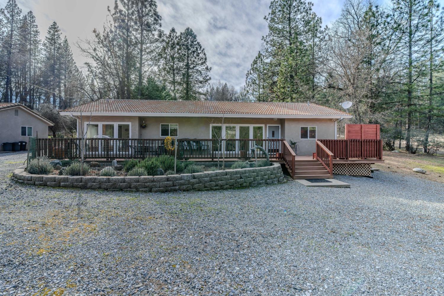 301 Bald Mountain Road West Point, CA 95255 - Photo 42 of 55 a view of a house with backyard and sitting area