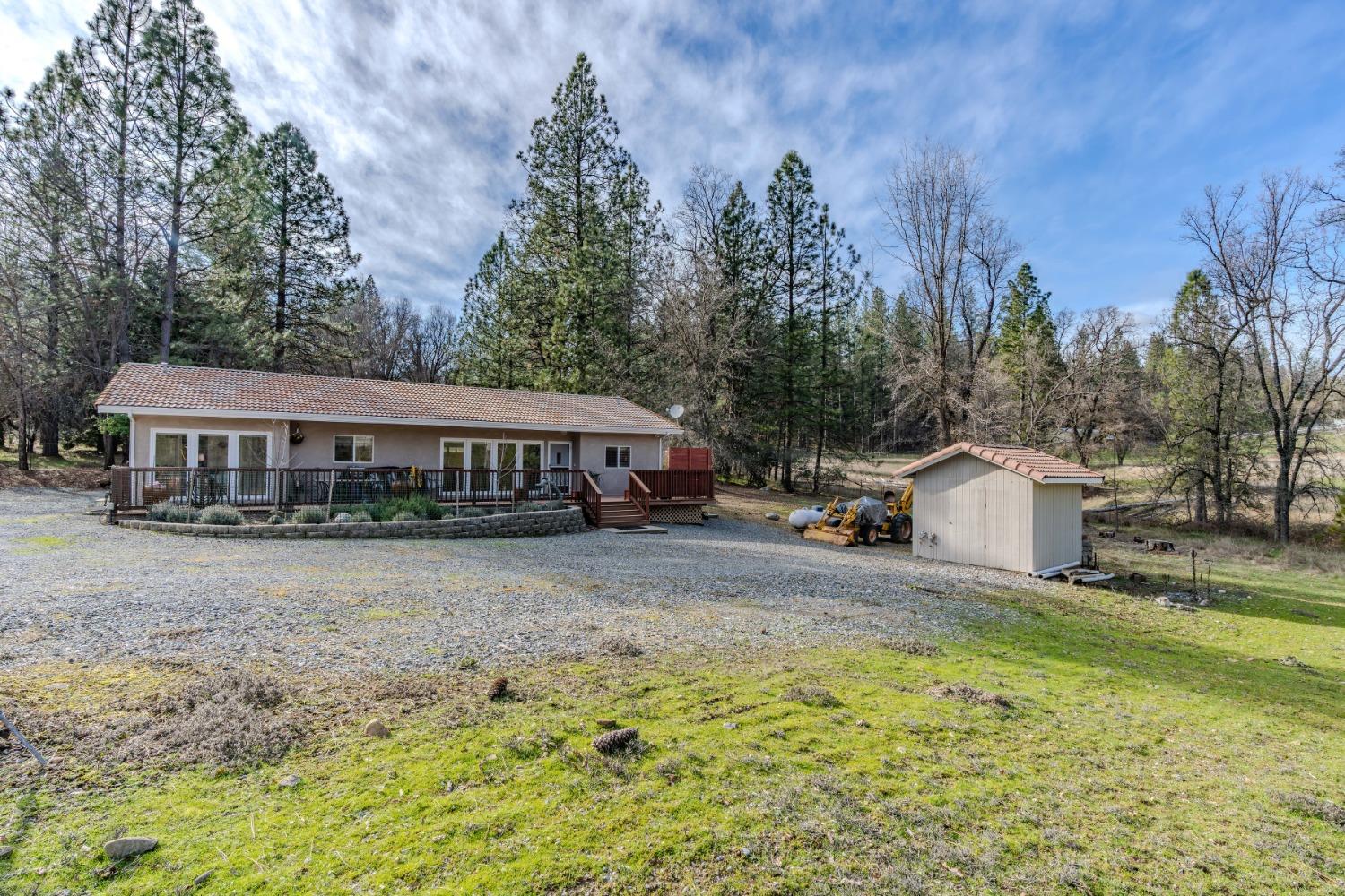 301 Bald Mountain Road West Point, CA 95255 - Photo 50 of 55 a view of a house with a yard and sitting area