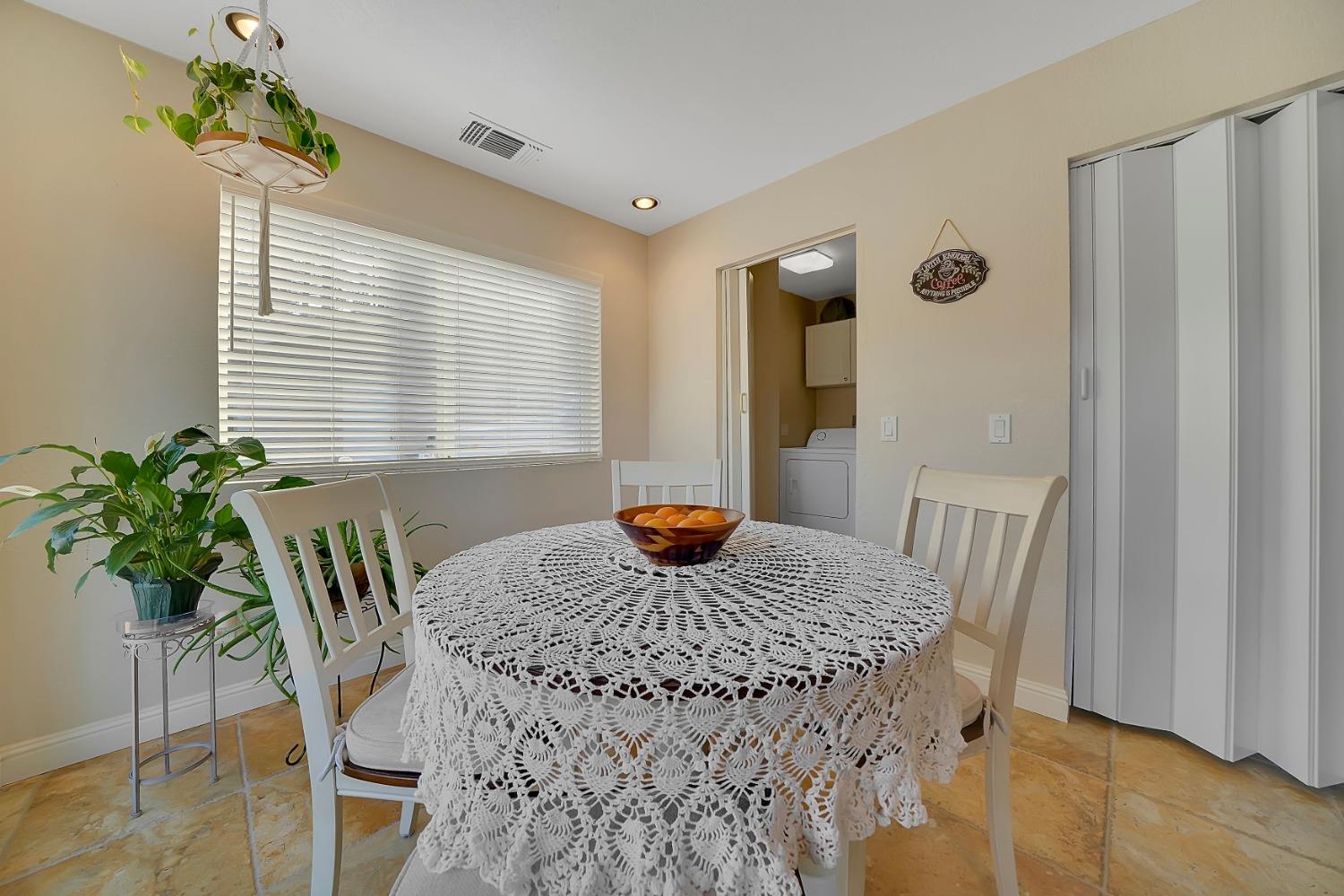 301 Bald Mountain Road West Point, CA 95255 - Photo 6 of 55 a view of a dining room with furniture window and wooden floor
