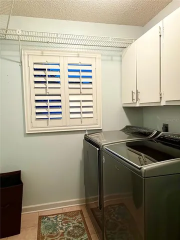 a kitchen with a stove and a microwave
