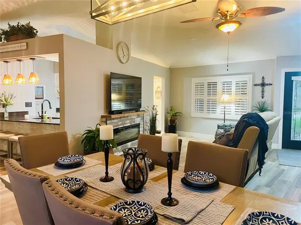 a view of a dining room with furniture window and outside view