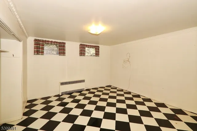 a black and white checkered floor with a black white checkered floor