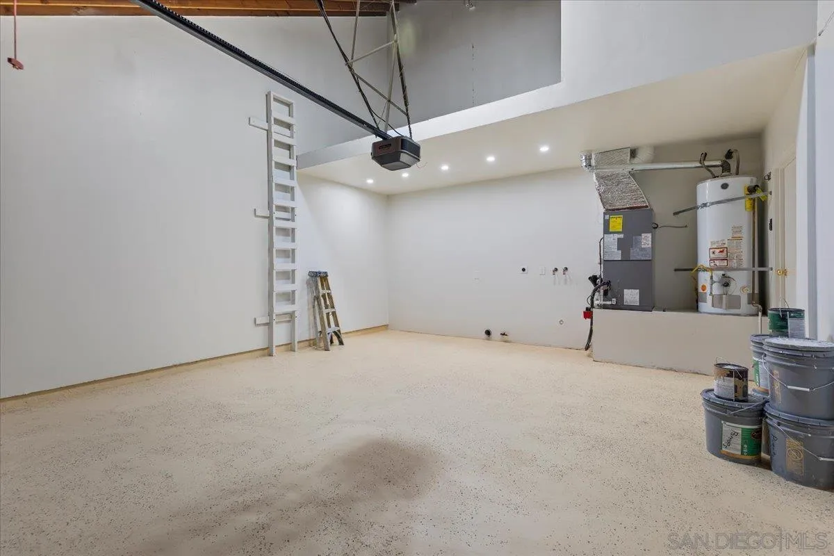 1572 Stone Edge Circle El Cajon, CA 92021 - Photo 17 of 34 a view of a livingroom with a fireplace and a ceiling fan