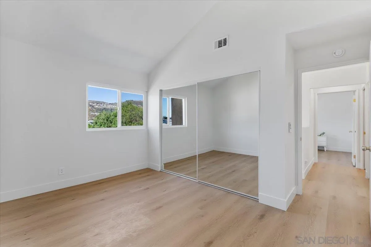 1572 Stone Edge Circle El Cajon, CA 92021 - Photo 23 of 34 an empty room with windows