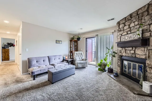 a living room with furniture and a couch