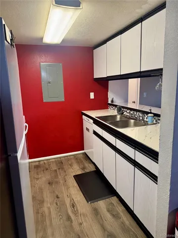 a kitchen with stainless steel appliances granite countertop a stove and a sink
