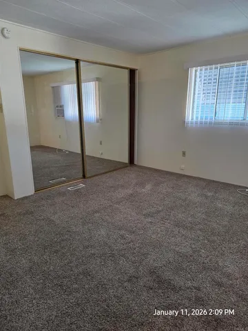 a view of a porch with wooden floor