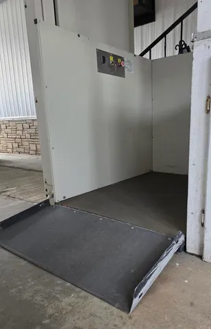 a swimming pool with outdoor seating