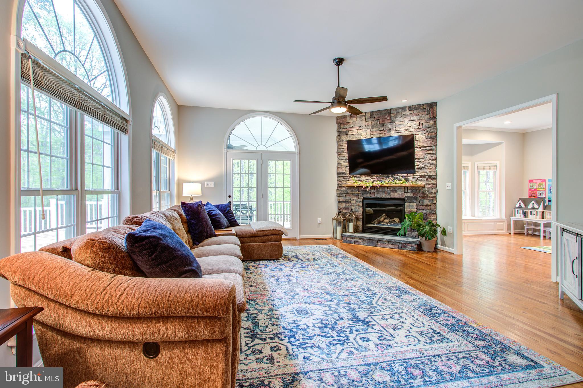 9390 Keyser Road Nokesville, VA 20181 - Photo 3 of 72 Family room has a custom stone gas log