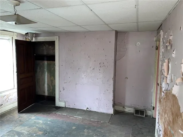 a close up of a sink and a window in a room