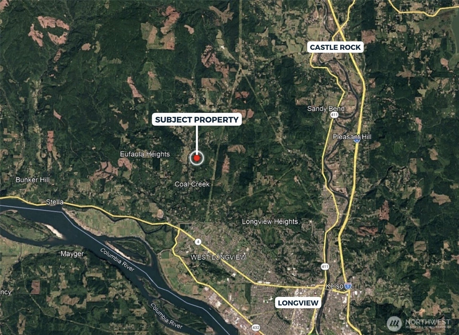 355 Ragland Road Longview, WA 98632 - Photo 6 of 24 a view of a street with sign board