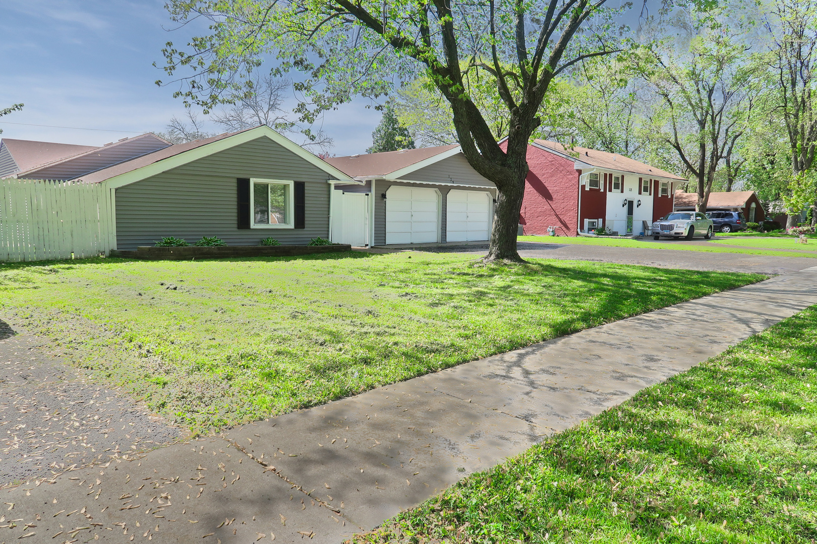 129 Kingston Road Bolingbrook, IL 60440 - Photo 3 of 37 a front view of a house with garden