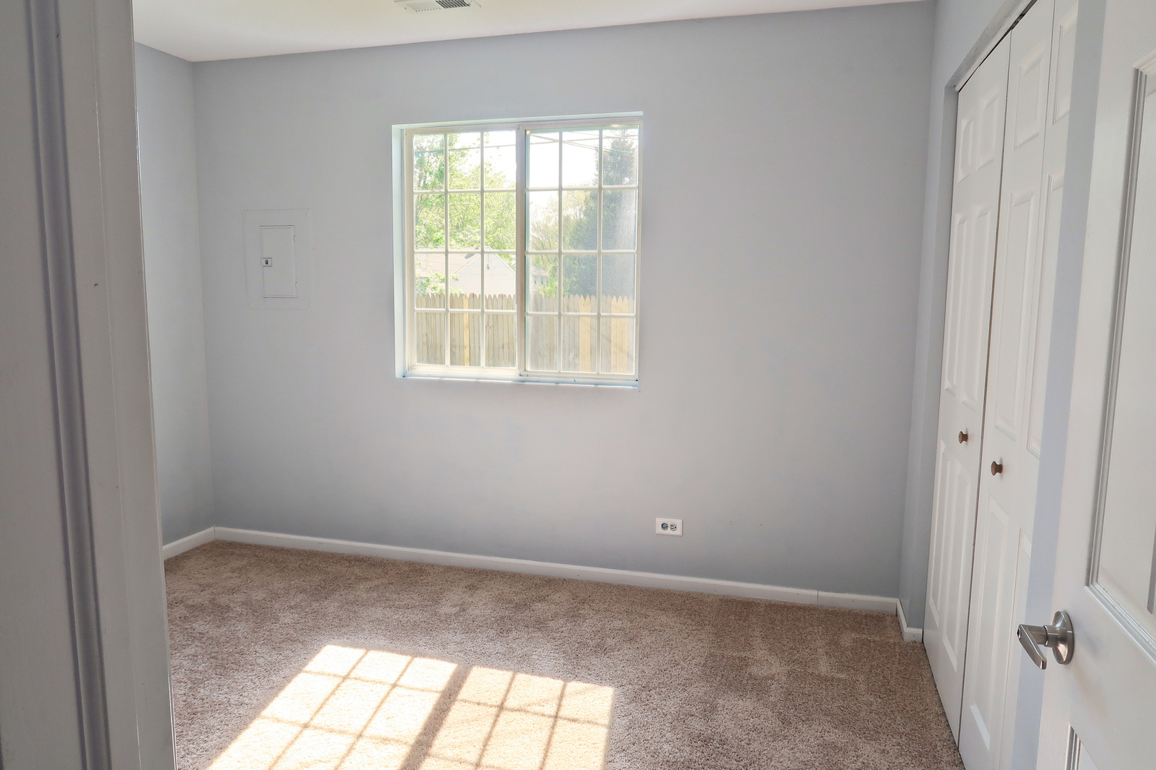 129 Kingston Road Bolingbrook, IL 60440 - Photo 21 of 37 a view of an empty room and window