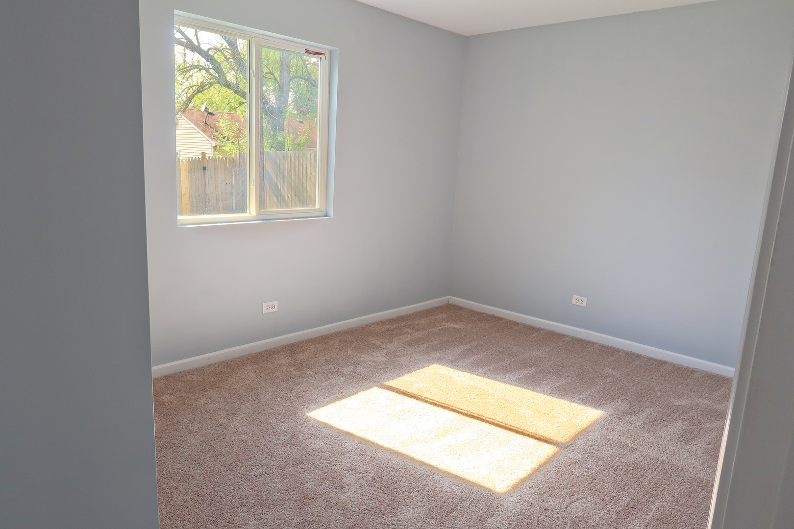 129 Kingston Road Bolingbrook, IL 60440 - Photo 22 of 37 an empty room with a window