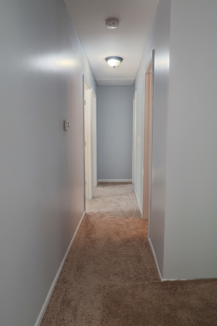 129 Kingston Road Bolingbrook, IL 60440 - Photo 31 of 37 a view of a hallway