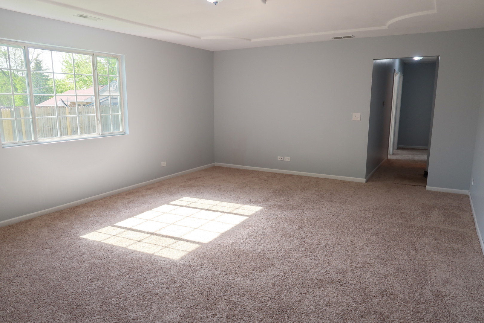 129 Kingston Road Bolingbrook, IL 60440 - Photo 6 of 37 an empty room with a empty space and windows