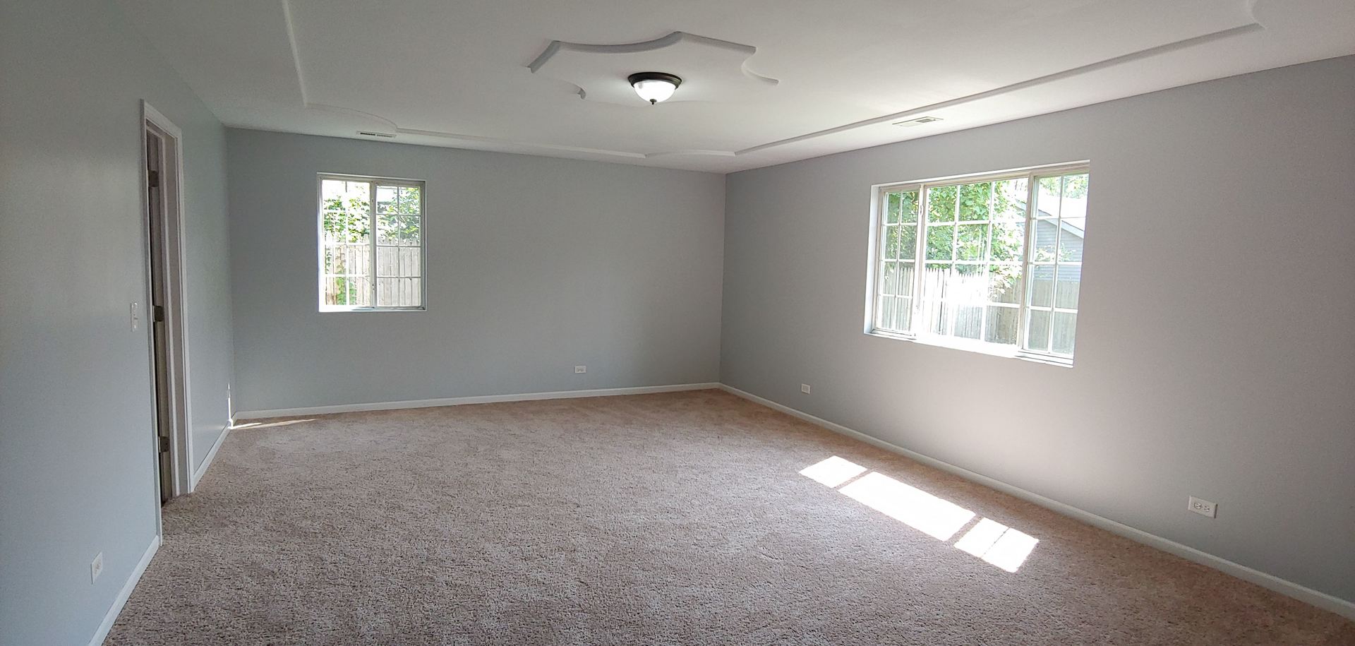 129 Kingston Road Bolingbrook, IL 60440 - Photo 9 of 37 an empty room with windows