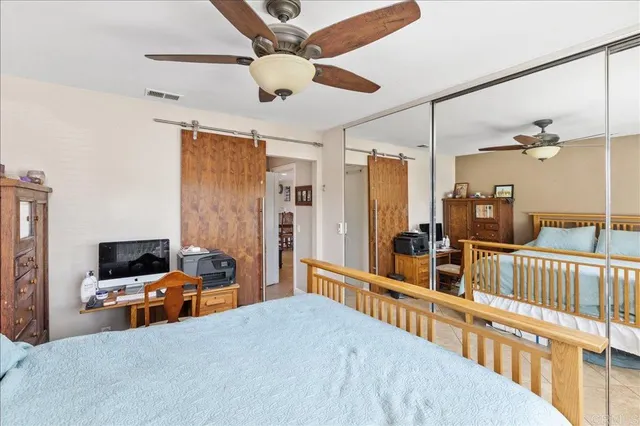 a room with furniture and a flat screen tv