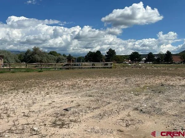 an aerial view of a houses with outdoor space