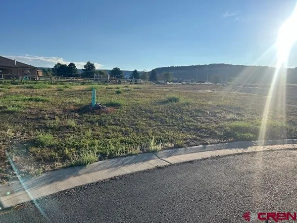 a view of a field with water view