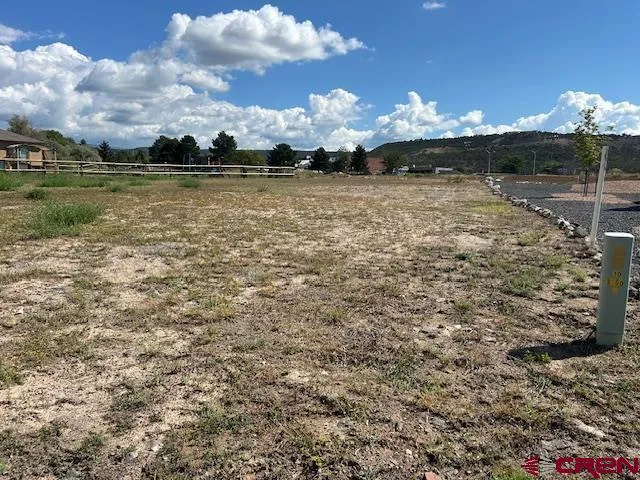 a view of a lake with a big yard