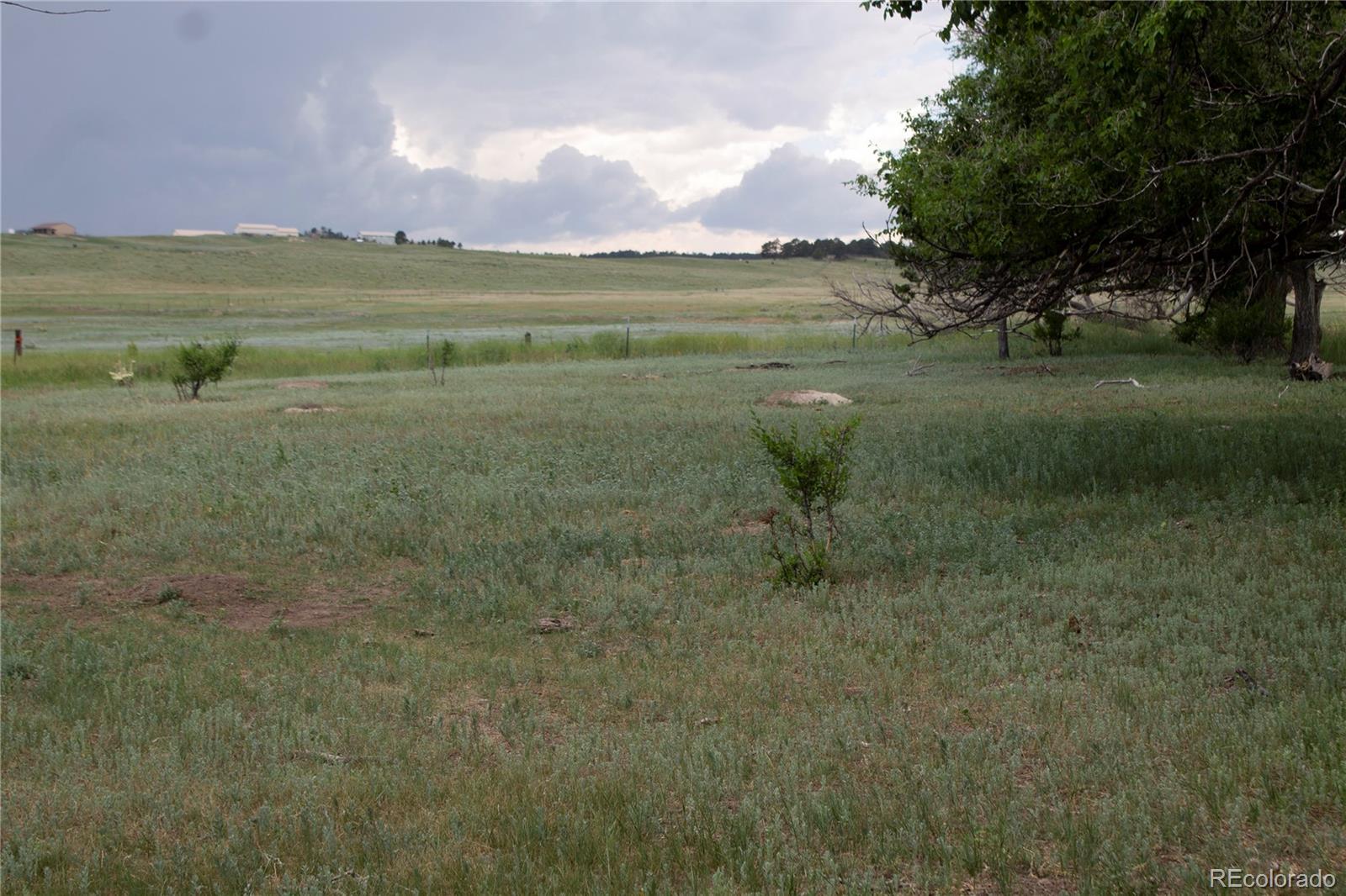 Mcclelland Road Calhan, CO 80808 - Photo 5 of 5 a view of a lake with a city