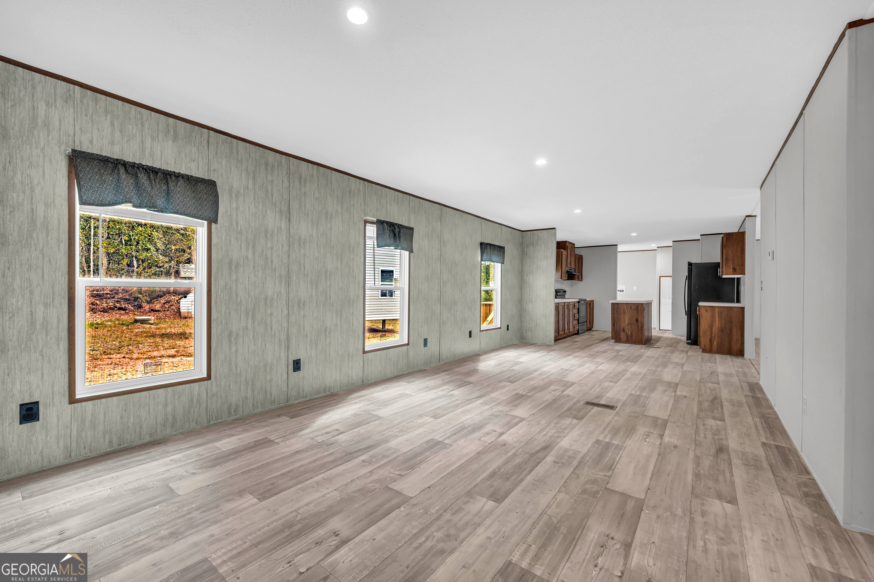 410 Wilson Cemetery Road Nicholson, GA 30565 - Photo 16 of 60 a view of an empty room with a window