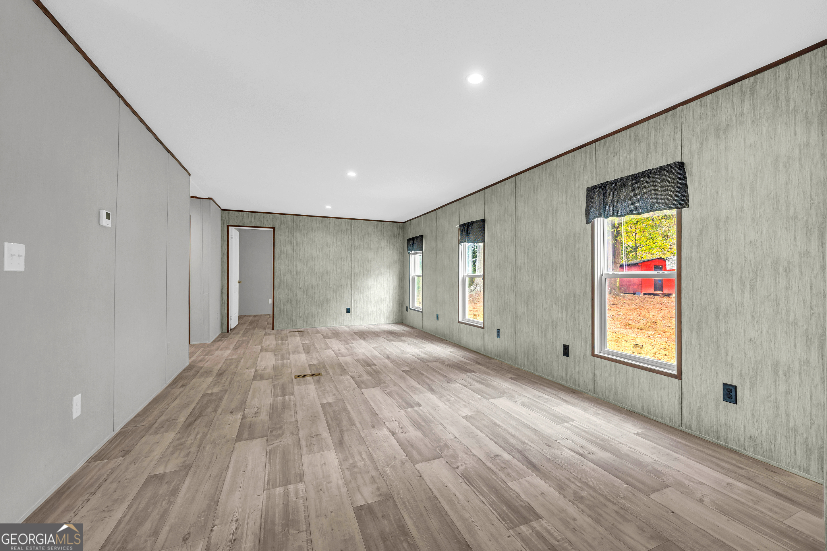 410 Wilson Cemetery Road Nicholson, GA 30565 - Photo 18 of 60 a view of an empty room and window