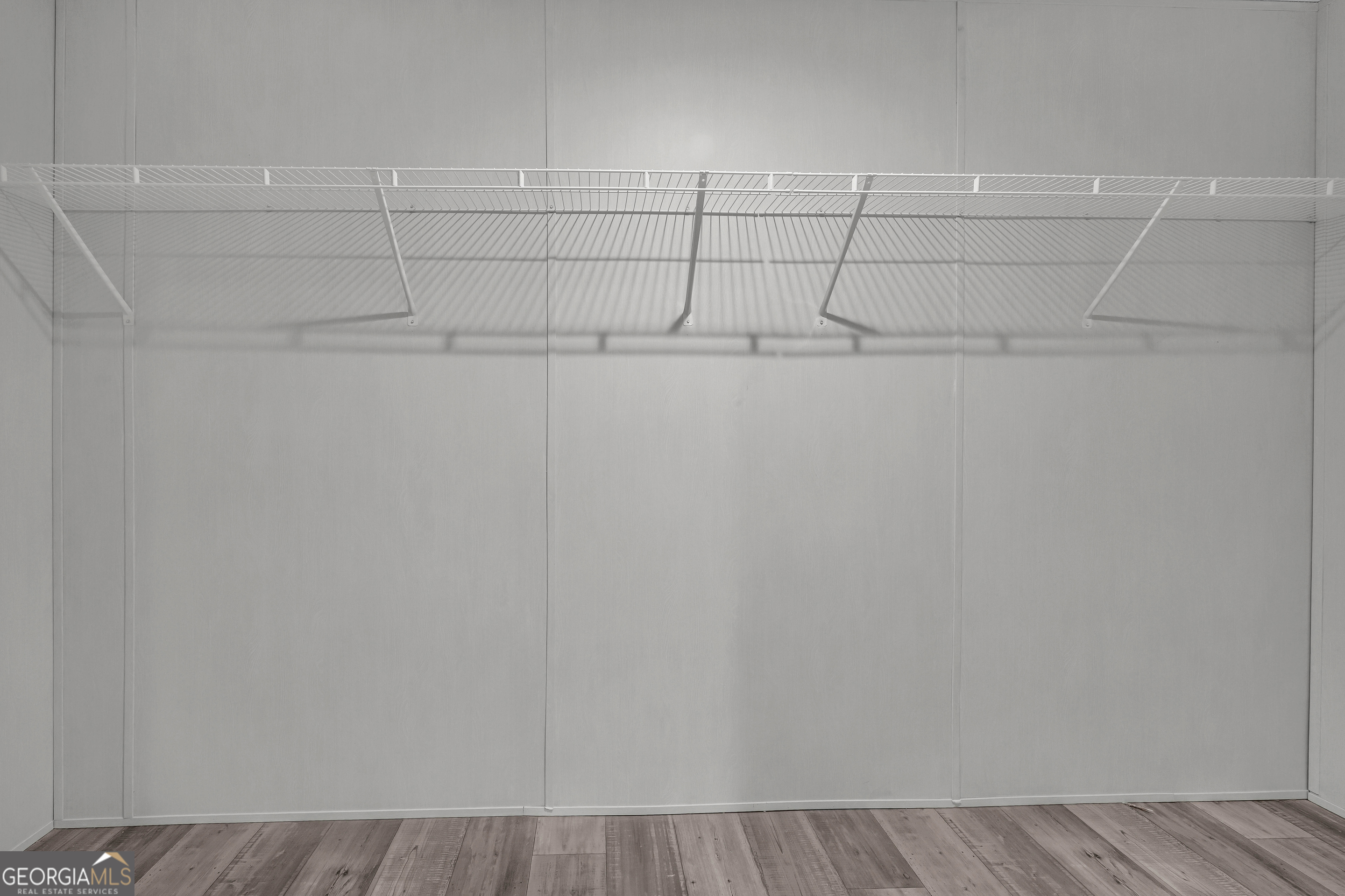 410 Wilson Cemetery Road Nicholson, GA 30565 - Photo 30 of 60 a view of a room with racks on the wall