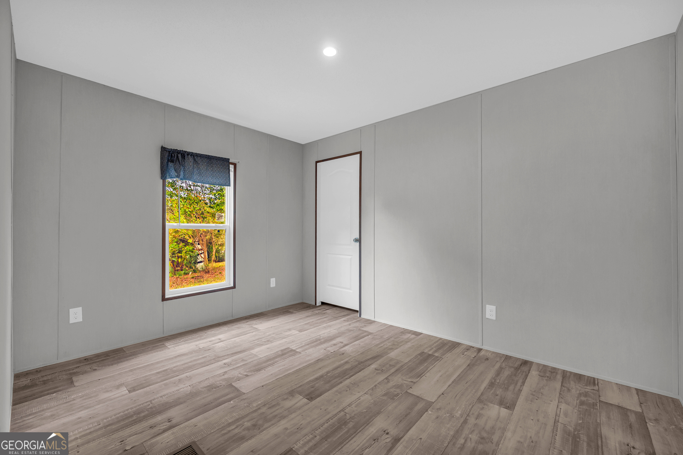 410 Wilson Cemetery Road Nicholson, GA 30565 - Photo 38 of 60 an empty room with windows and closet