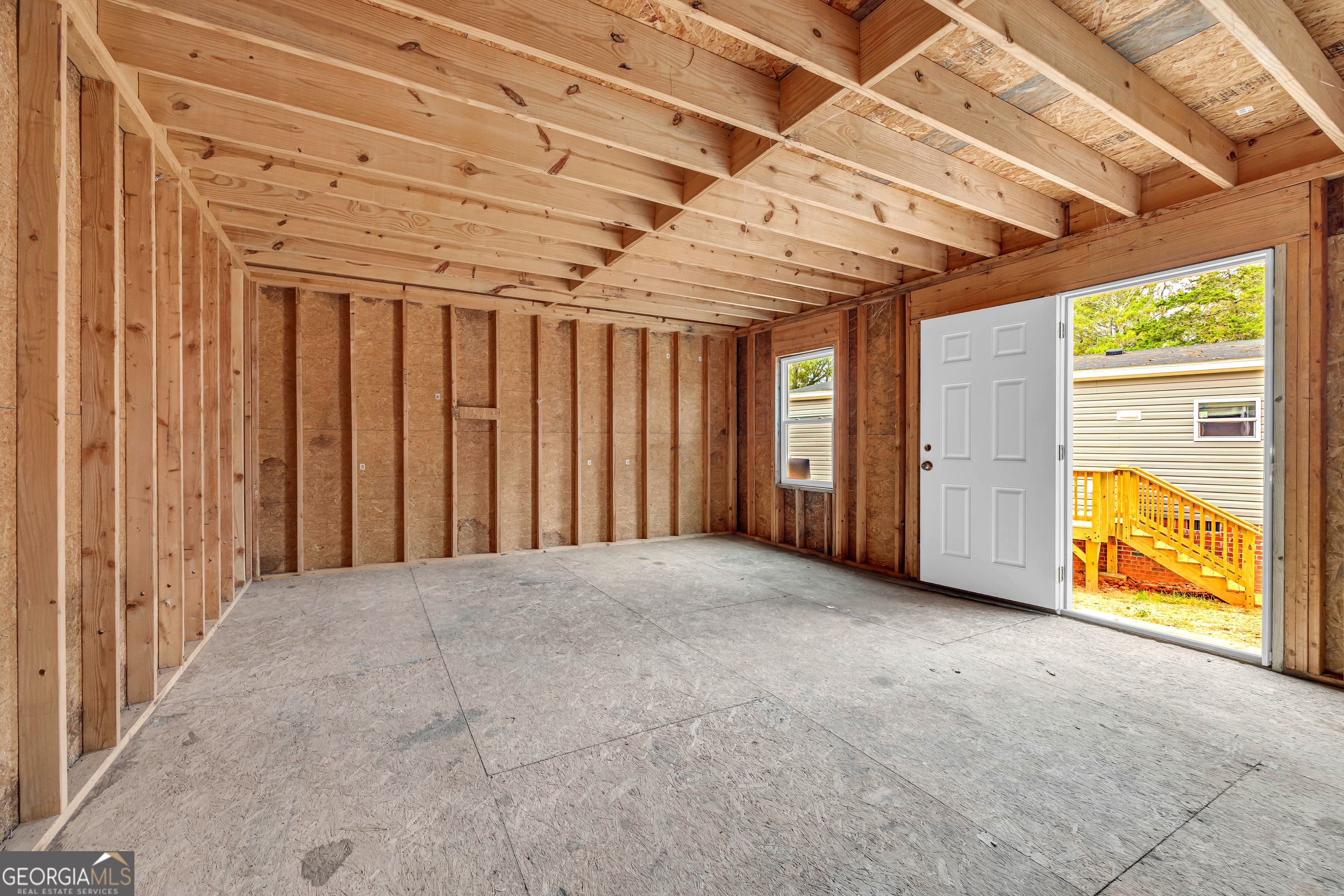 410 Wilson Cemetery Road Nicholson, GA 30565 - Photo 41 of 60 a view of a room with large windows