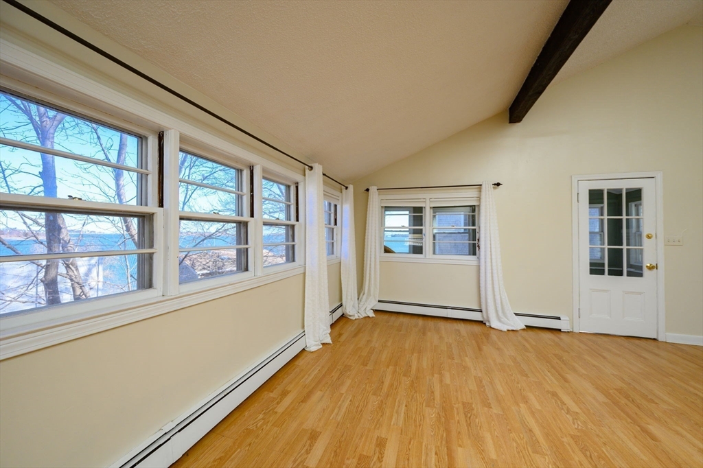 81 Kimball Beach Road Hingham, MA 02043 - Photo 12 of 29 a view of an empty room with a window