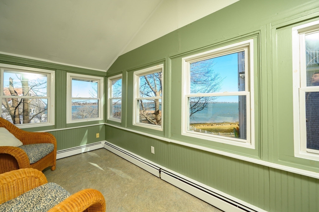 81 Kimball Beach Road Hingham, MA 02043 - Photo 14 of 29 a room with furniture and a large window