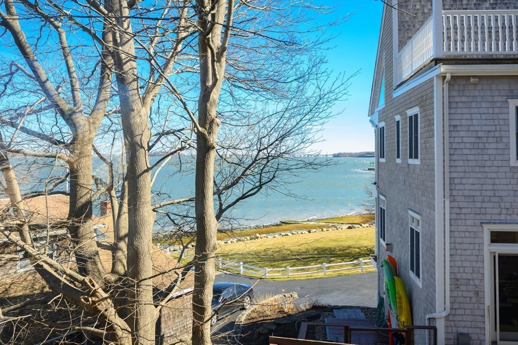 81 Kimball Beach Road Hingham, MA 02043 - Photo 19 of 29 a view of a yard with an outdoor space