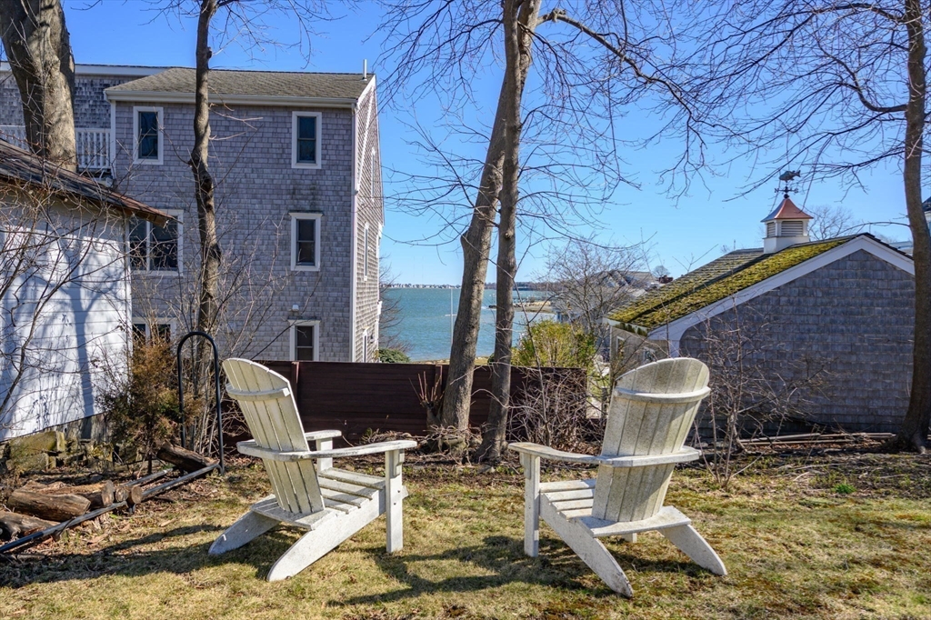 81 Kimball Beach Road Hingham, MA 02043 - Photo 2 of 29 a view of backyard with outdoor seating