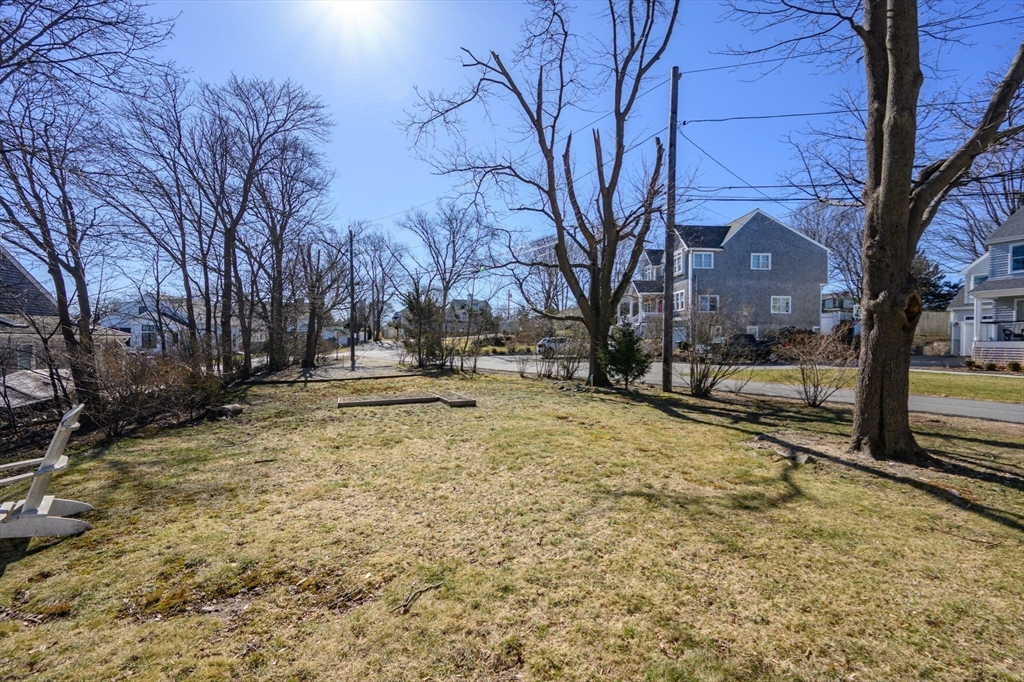 81 Kimball Beach Road Hingham, MA 02043 - Photo 21 of 29 a view of road with large trees