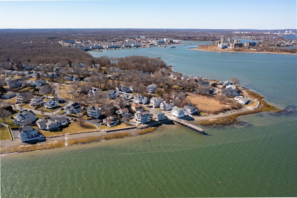81 Kimball Beach Road Hingham, MA 02043 - Photo 4 of 29 an aerial view of a house with a ocean view