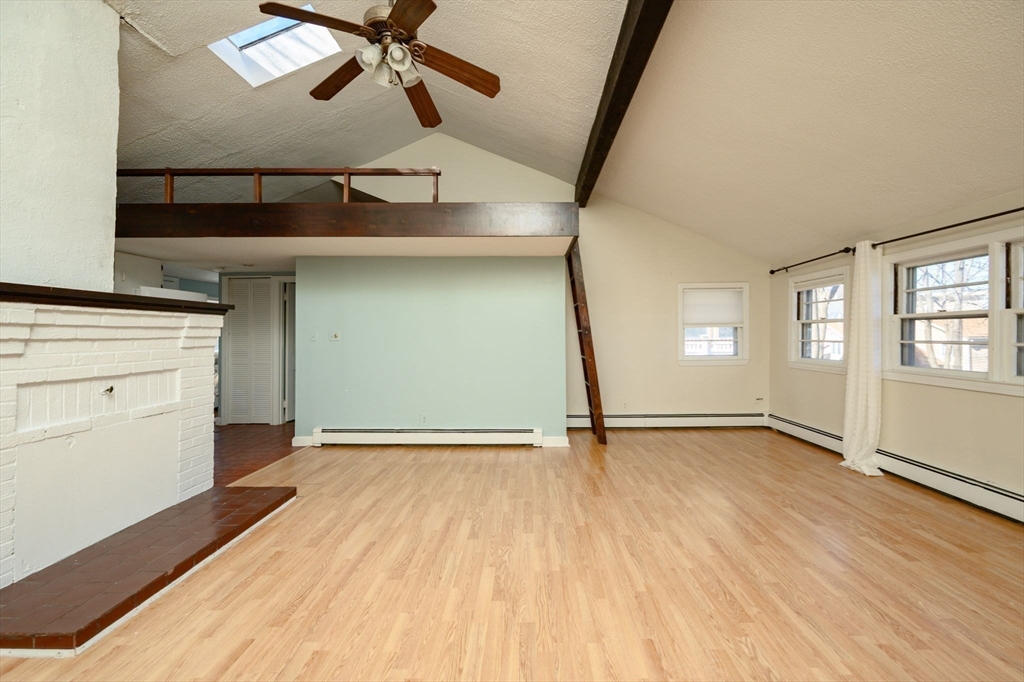 81 Kimball Beach Road Hingham, MA 02043 - Photo 8 of 29 wooden floor in an empty room with a window