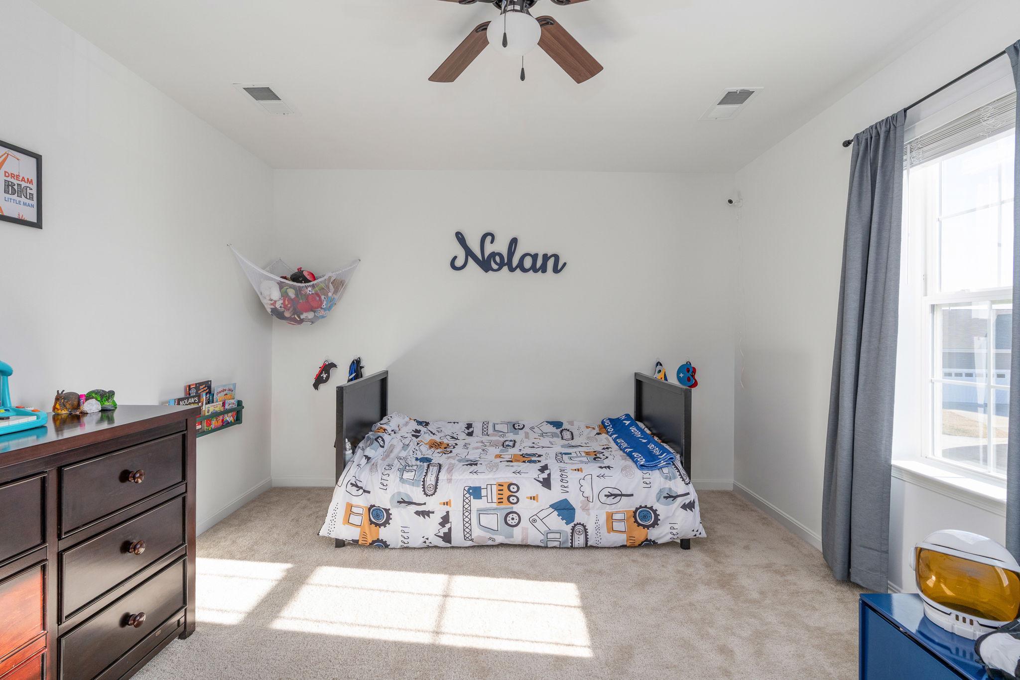 6371 Pointer Lane King George, VA 22485 - Photo 16 of 38 a bedroom with a bed and a window