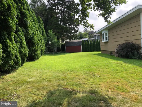 a garden view with a seating space