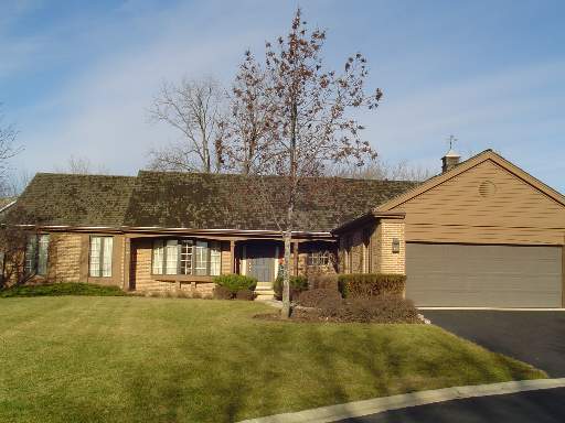 189 Rosslyn Lane Inverness, IL 60067 - Photo 1 of 1 a view of a house with backyard and porch