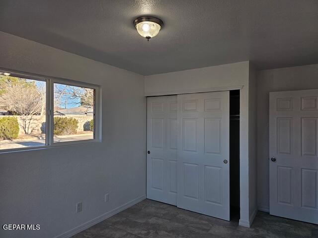 4701 R T Cassidy Drive El Paso, TX 79924 - Photo 29 of 32 an empty room with windows and closet